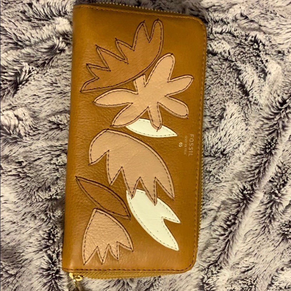Fossil leather wallet with wrist strap